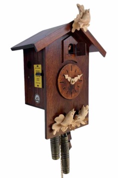 Koekoeksklok met vogels, bladeren en takken